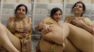 Voluptuous Pakistani Beauty Reveals Her Intimate Depths Under The Cascading Shower Spray