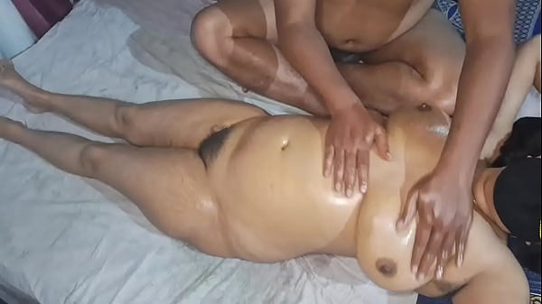 Desi Indian Hot Bhabhi Gets A Full Nude Oil Massage, Her Curves Glistening Under His Hands.
