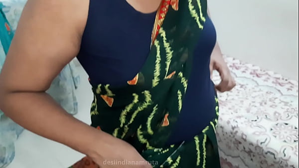 Desi Hot Indian Bhabhi In A Tight Dark Green Saree, Curves Teasing Through The Silk